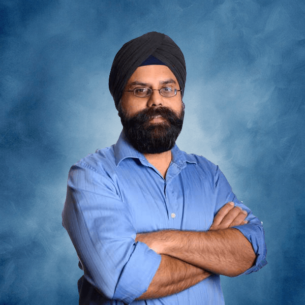 Dr. Gurpreet S. Bajaj, a Board-Certified Orthopaedic Surgeon in Texas, smiling for a picture.